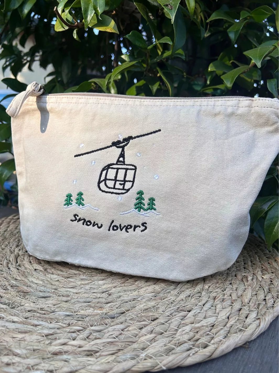 recycled cotton embroidered travel pouch snow lovers