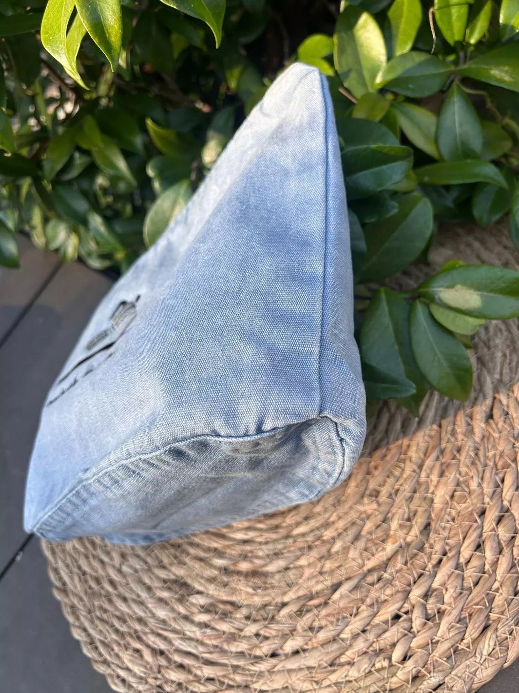 Motivation Loading recycled cotton pouch in washed sky