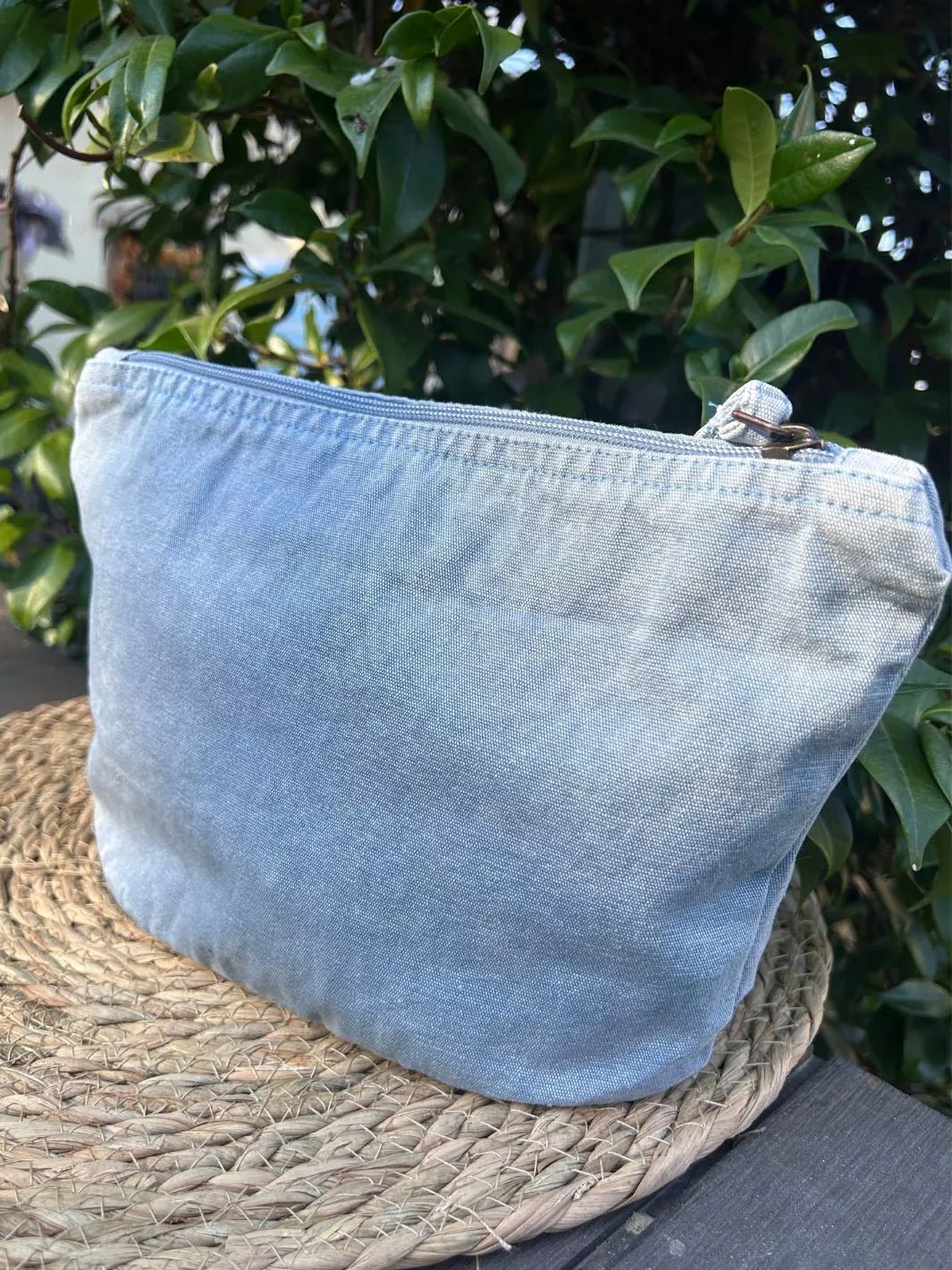 Motivation Loading recycled cotton pouch in washed sky