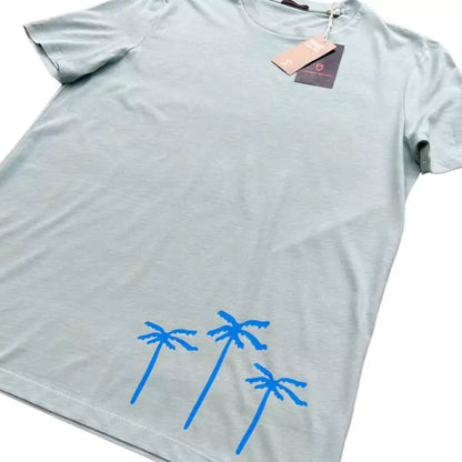 jade green organic cotton t-shirt with palm tree and surfboard print as a tribute to the city of tarifa