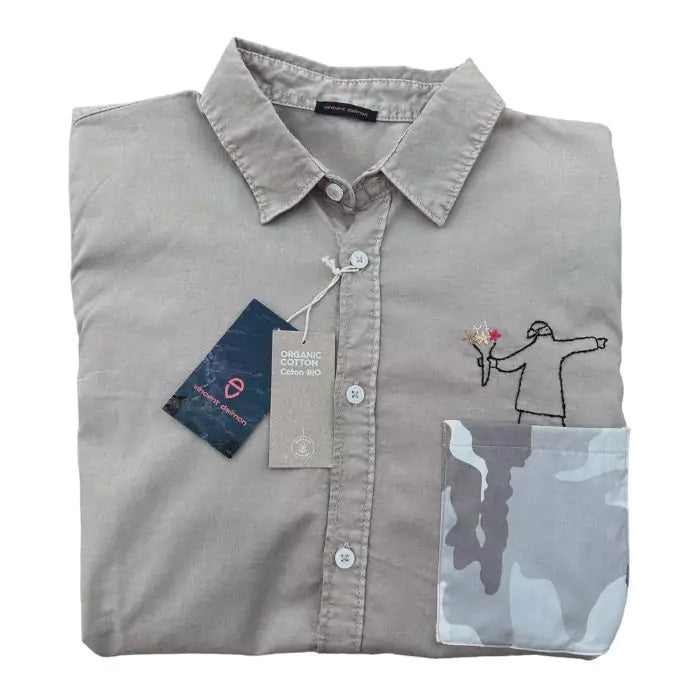 Organic cotton shirt with banksy embroidered above a military pocket