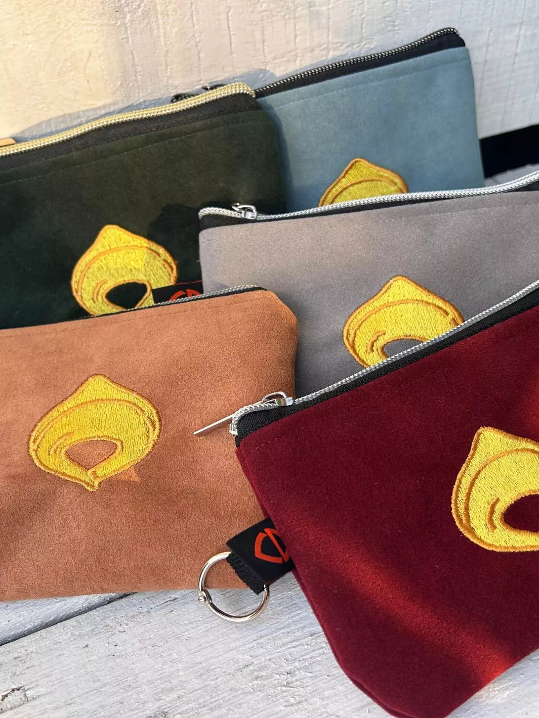 embroidered alcantara pouch