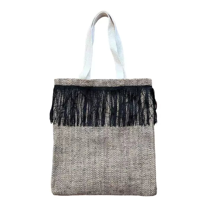 100% natural shopper bag composed of black and brown jute strands and black stitched bangs