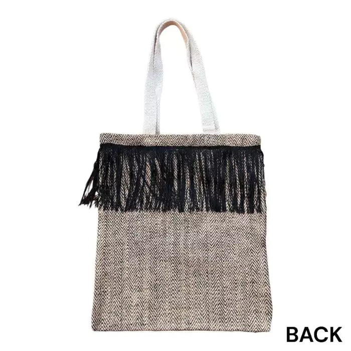 100% natural shopper bag composed of black and brown jute strands and black stitched bangs