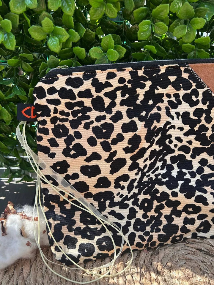 Handmade pouch with beige and black leopard print cotton fabric and light brown Alcantara panel