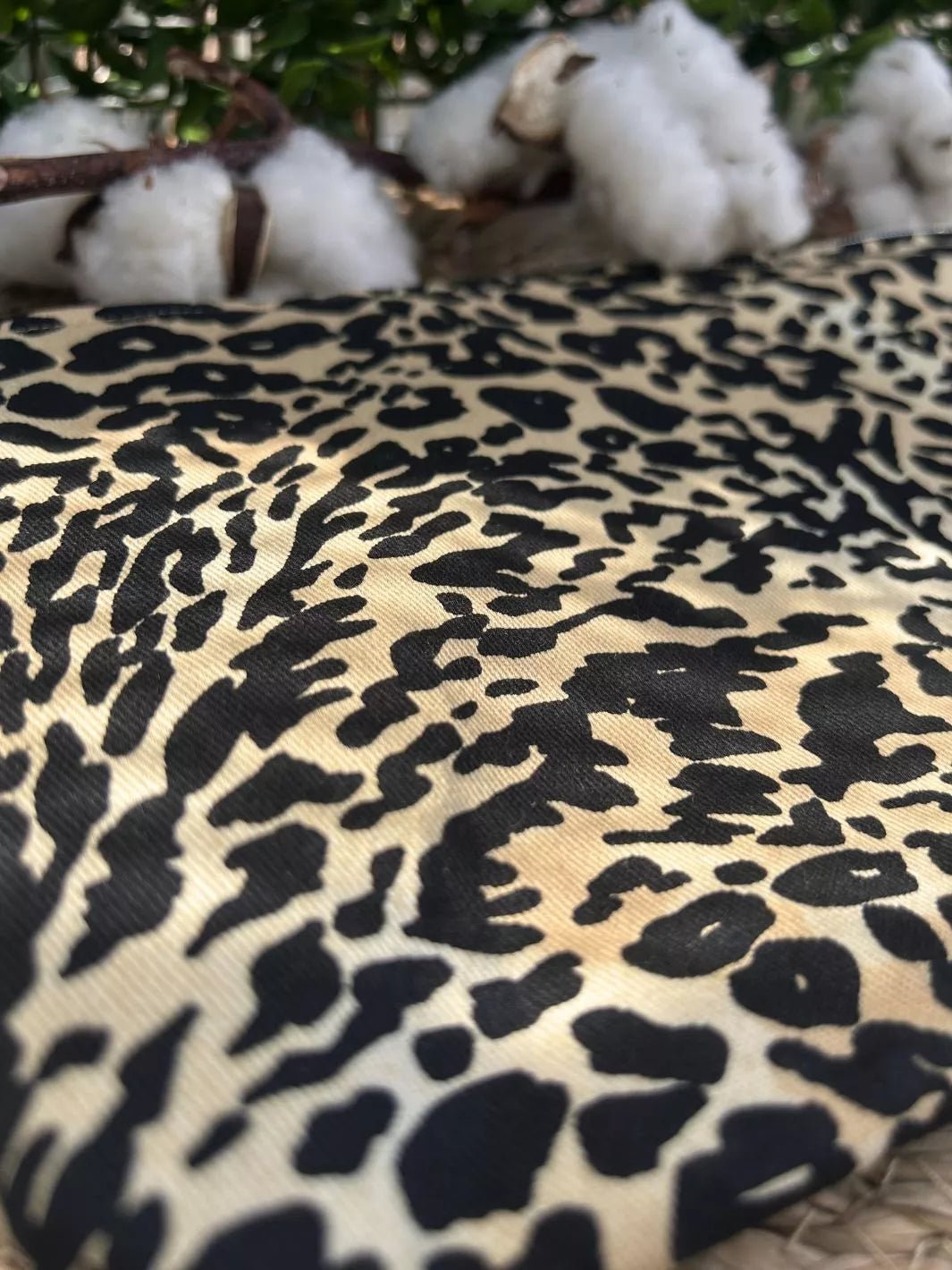 Handmade pouch with beige and black leopard print cotton fabric and light brown Alcantara panel