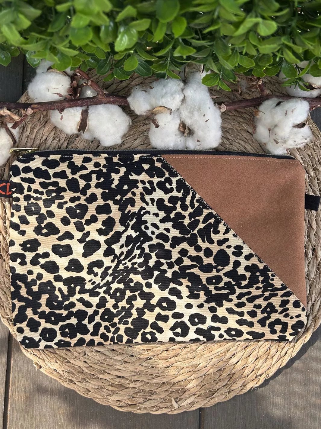 Handmade pouch with beige and black leopard print cotton fabric and light brown Alcantara panel