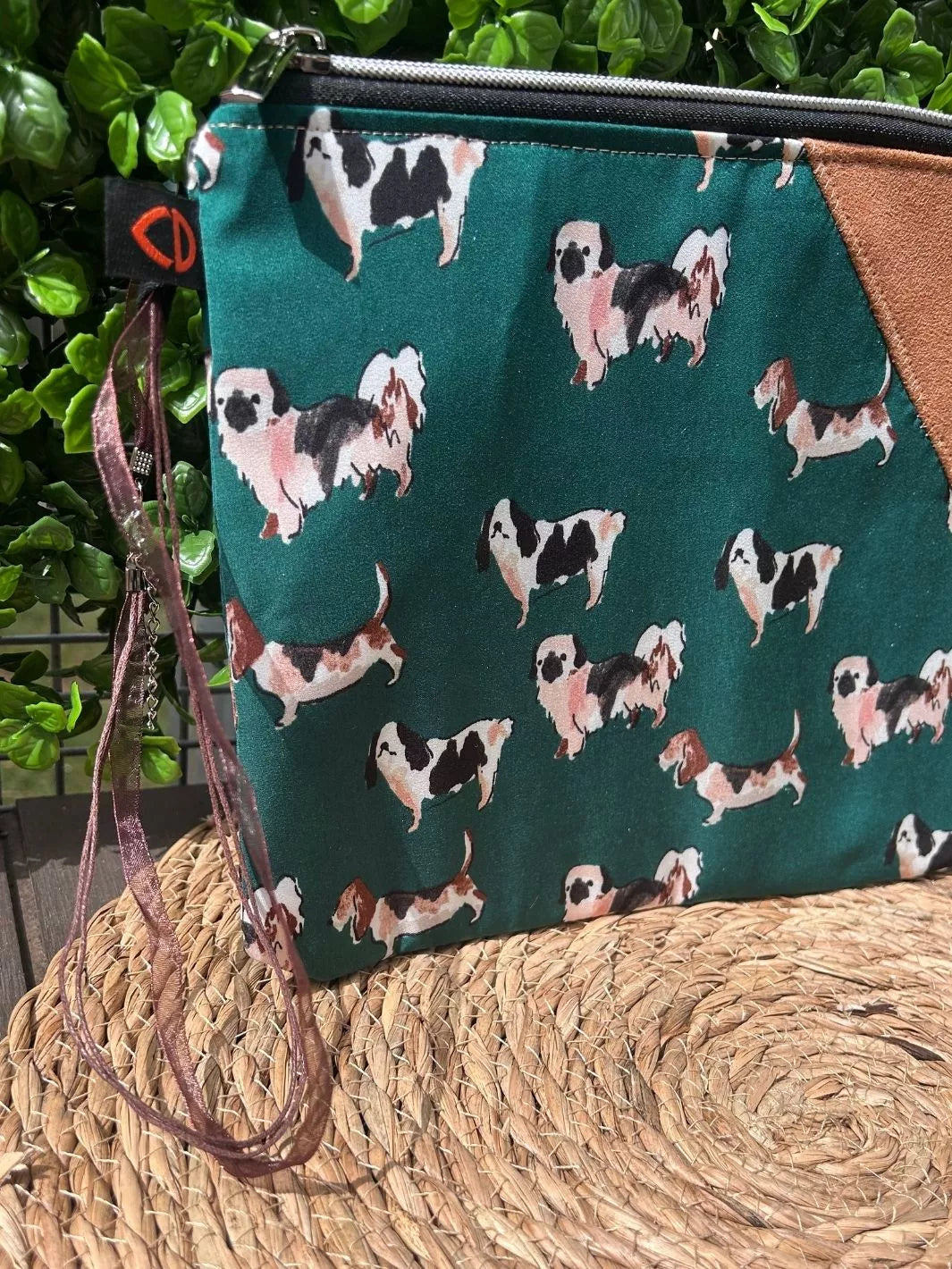 Lucky Paw handmade pouch with forest green dog print cotton fabric and tan Alcantara panel