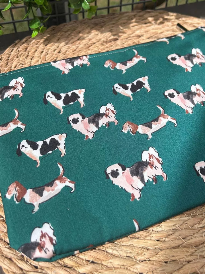 Lucky Paw handmade pouch with forest green dog print cotton fabric and tan Alcantara panel