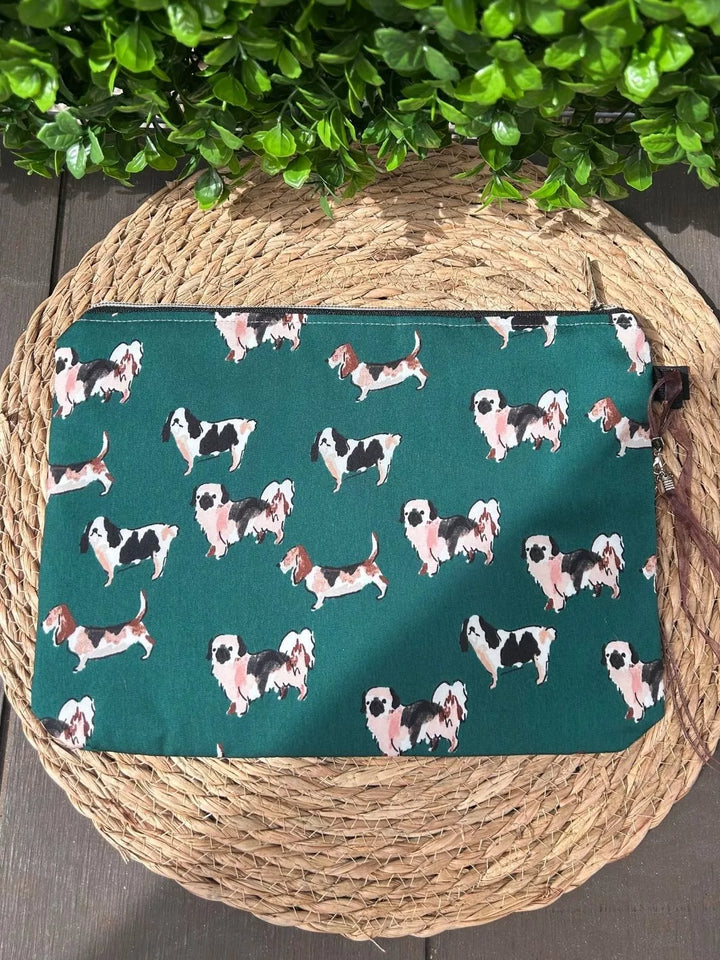 Lucky Paw handmade pouch with forest green dog print cotton fabric and tan Alcantara panel