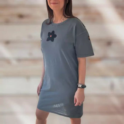 organic cotton t-shirt dress with stitched fringes and crocheted flower with button in the centre
