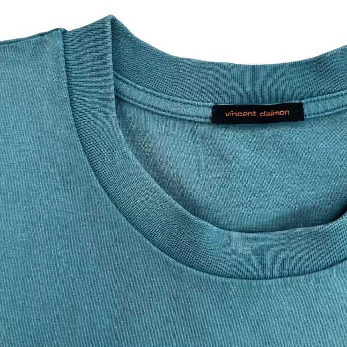 Organic cotton t-shirt in plain hydro color with irregular washed effect