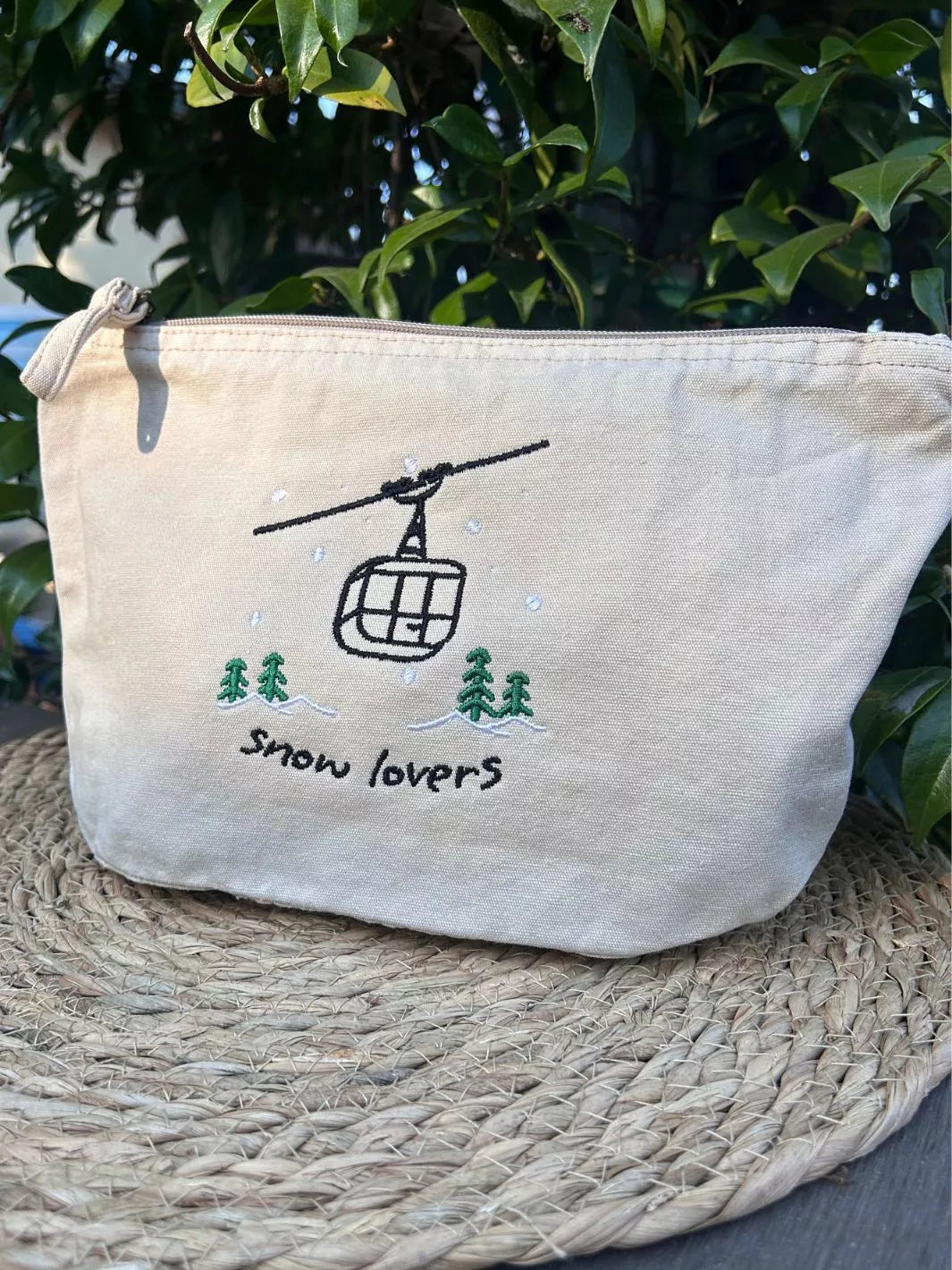 recycled cotton embroidered travel pouch snow lovers