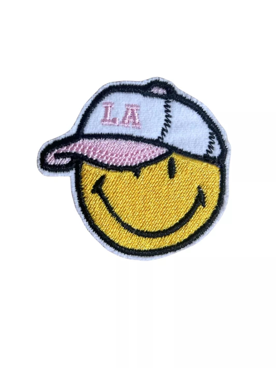 smile with LA cap patch