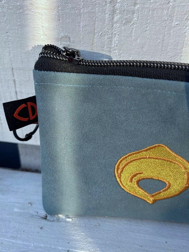 tortellino embroidered alcantara pouch