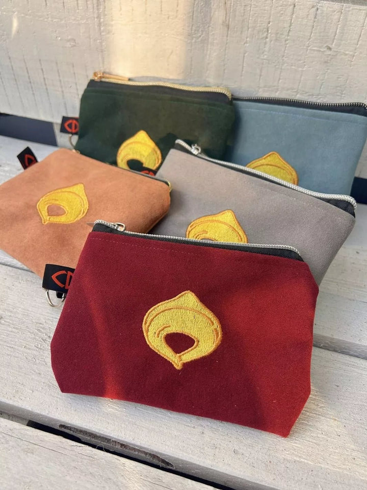 tortellino embroidered alcantara pouch
