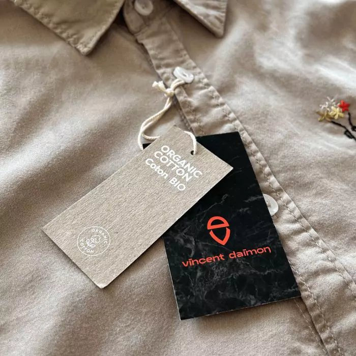 Organic cotton shirt with banksy embroidered above a military pocket