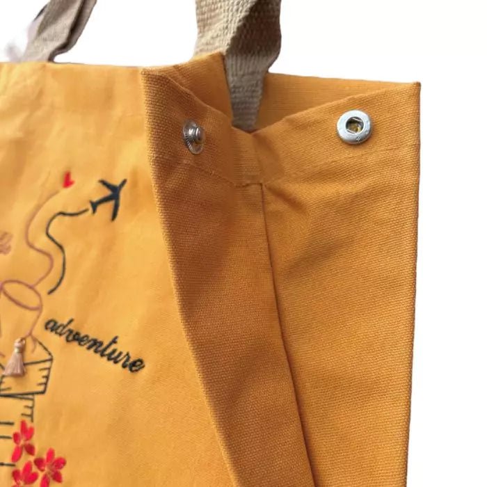 natural fabrics shopper bag in caraway yellow cotton and classic jute embroidered coffe adventure