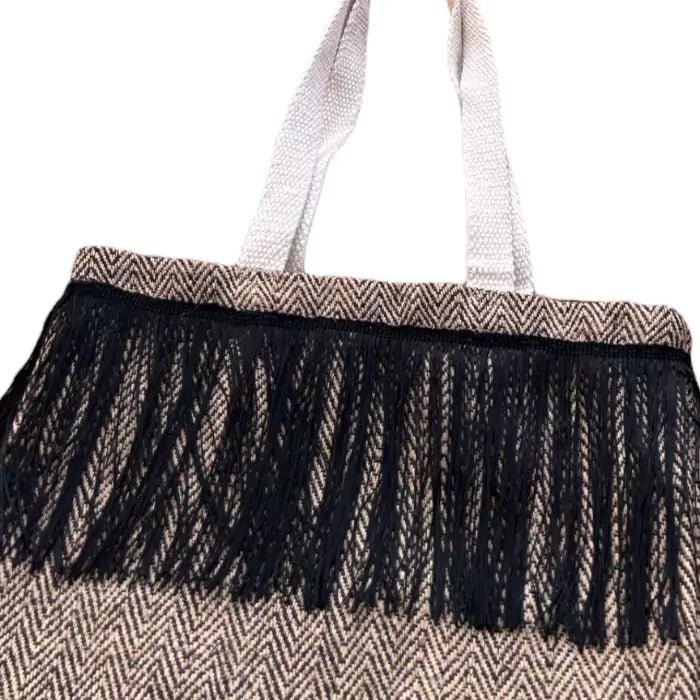 100% natural shopper bag composed of black and brown jute strands and black stitched bangs