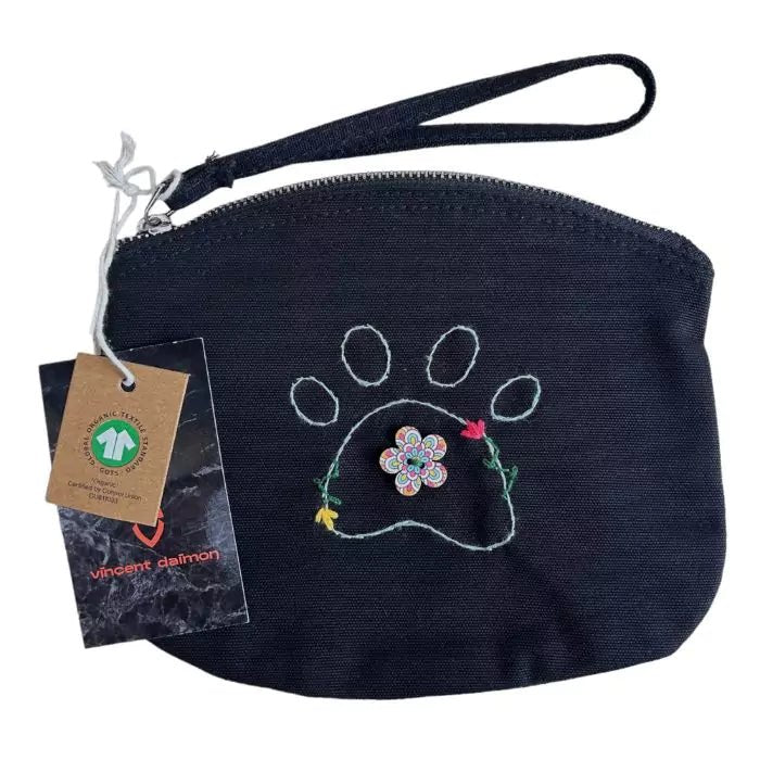 Black clutch bag in organic cotton with an embroidered dog paw adorned with flowers