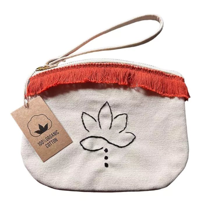 organic cotton clutch bag with a hand-embroidered lotus flower and an orange fringe sewn on top