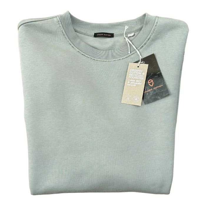 Eco-sustainable almond green sweatshirt with embroidery along the seams of the collar and right wrist